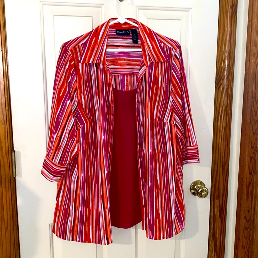 Maggie Barnes blouse is a size 14/16